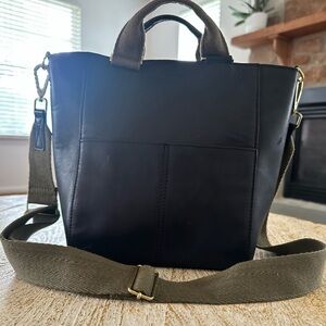 Feed leather handbag